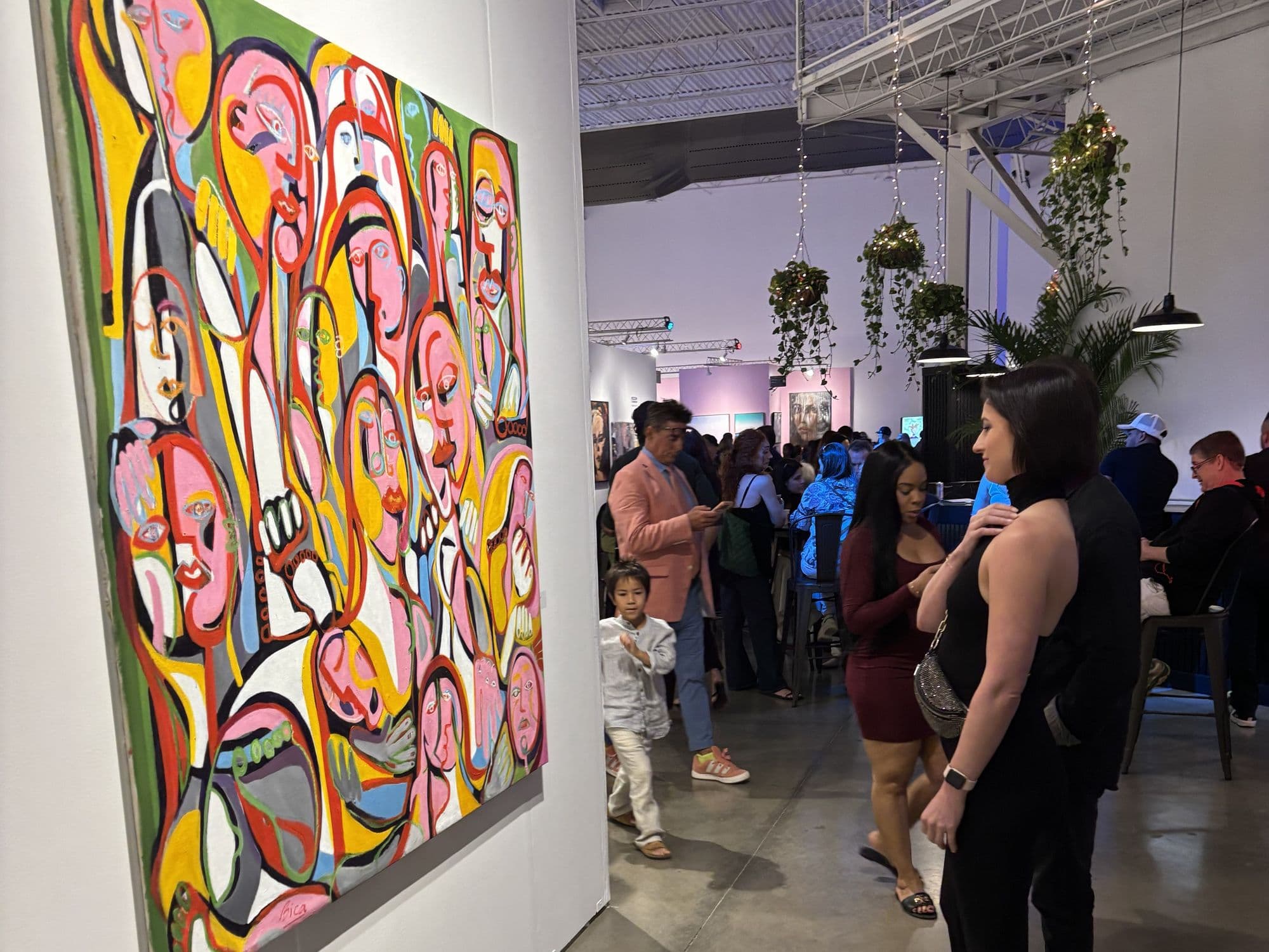 Collectors in the gallery during an opening