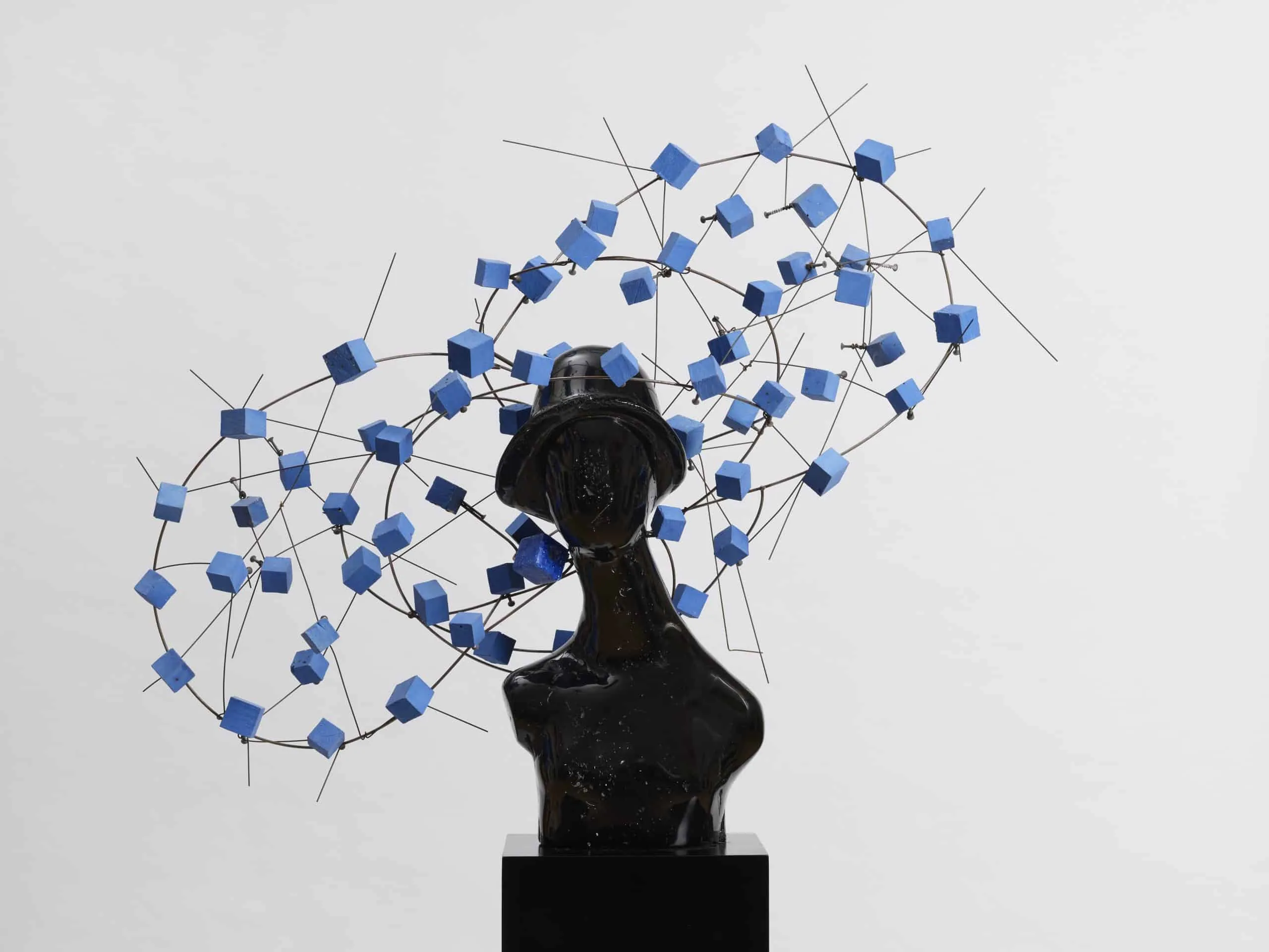 Woman with Ceramic Cubes, 2024