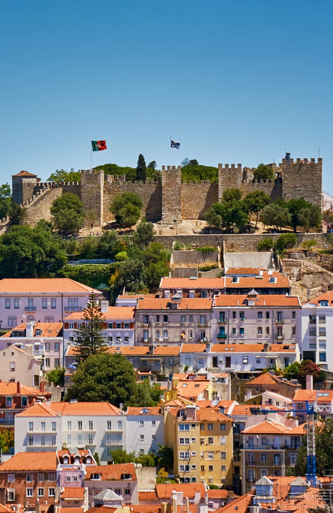 S&atilde;o Jorge Castle above the terracotta rooftops of Alfama in Lisbon, the setting for the Intersections exhibition