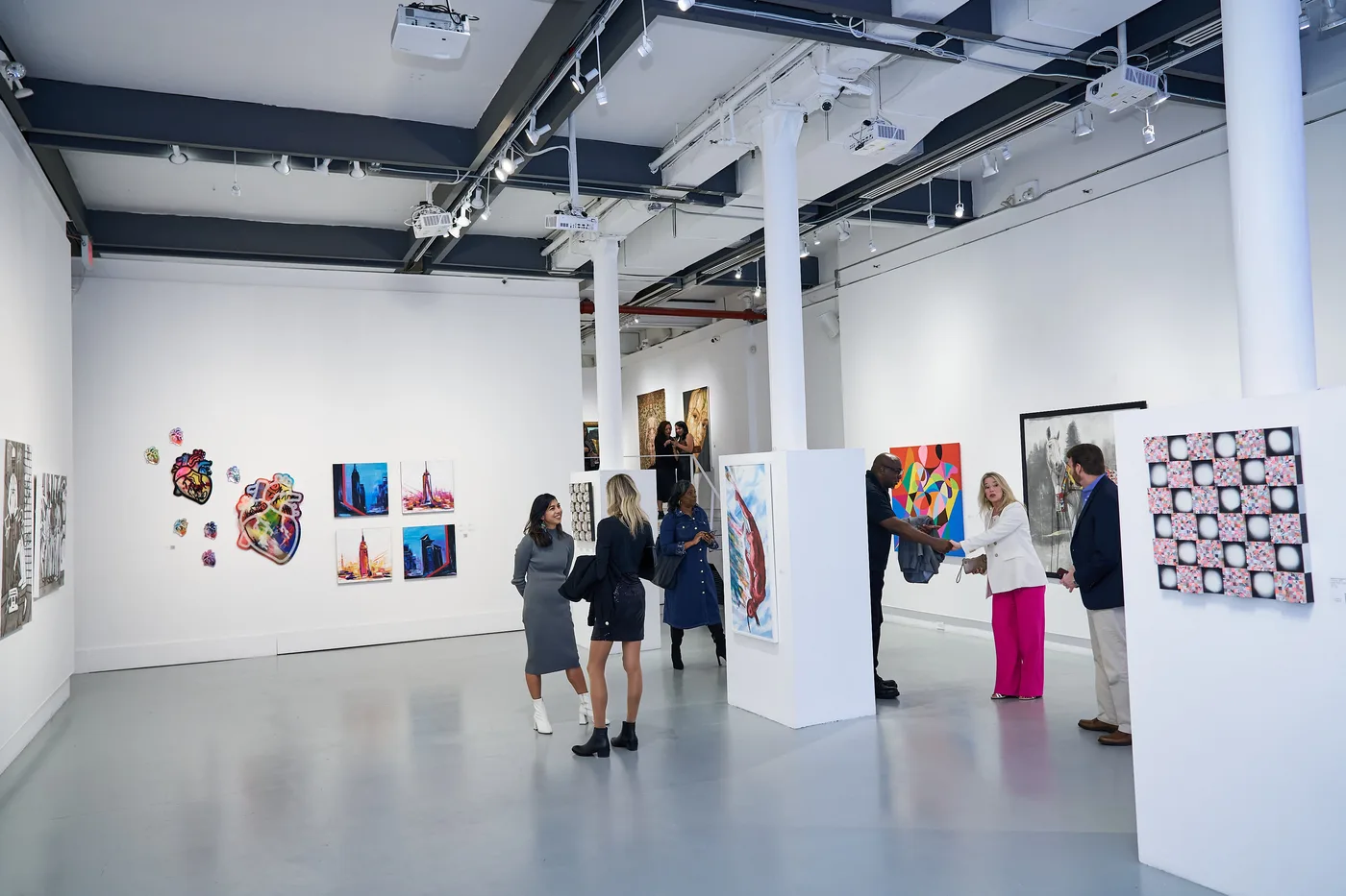 Visitors in the gallery during the New York I Love You exhibition, Agora Gallery, October 2024