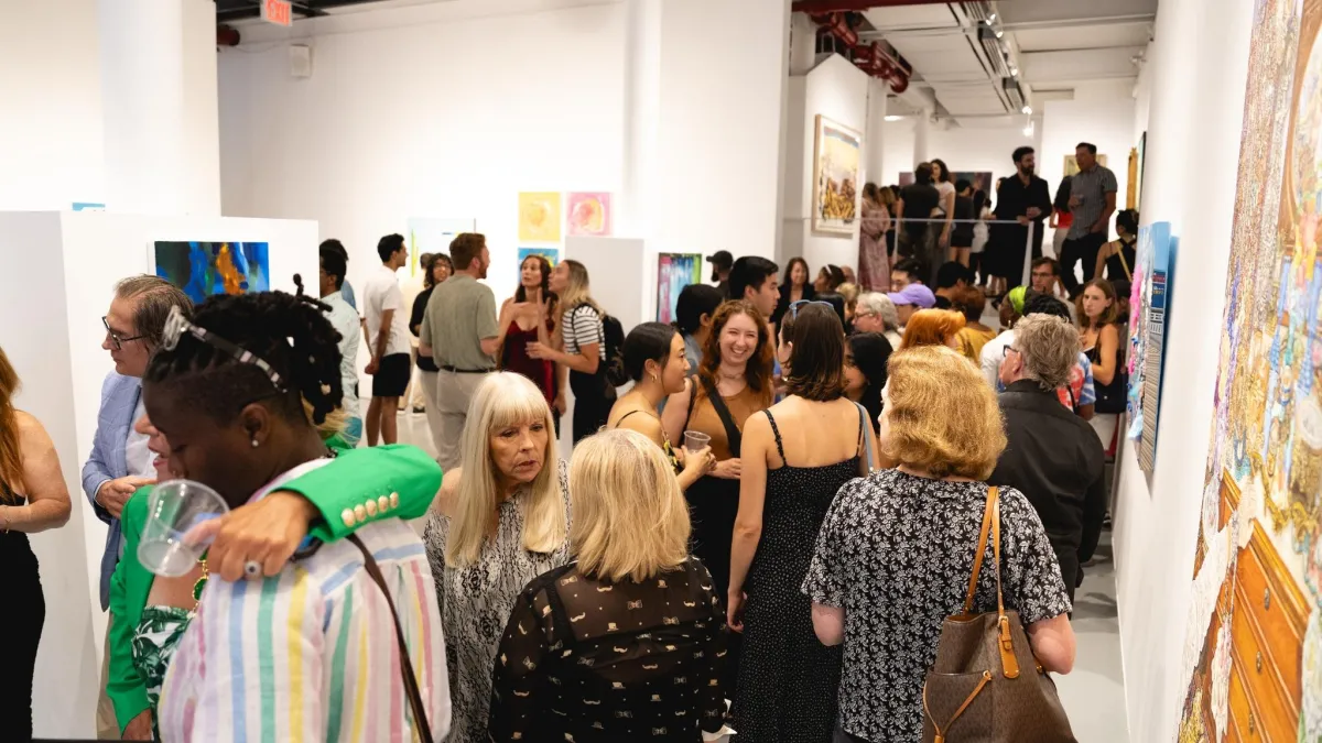 Visitors at an AGI Fine Art opening in Chelsea