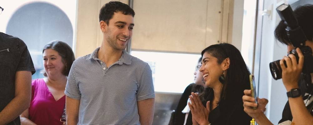 Guests talking at an opening