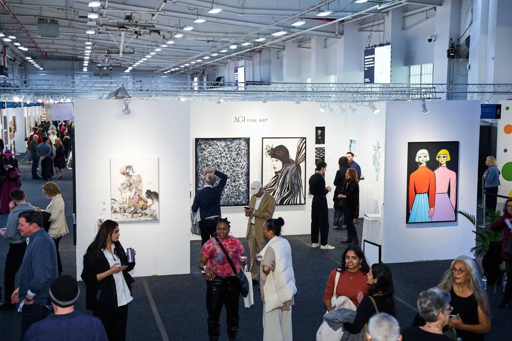 Visitors in the AGI Fine Art booth at Artexpo New York