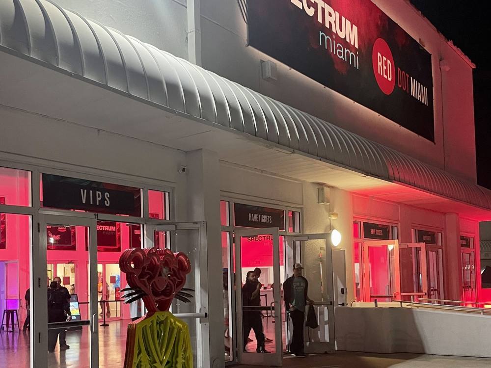 The entrance to Spectrum Miami and Red Dot Miami at night
