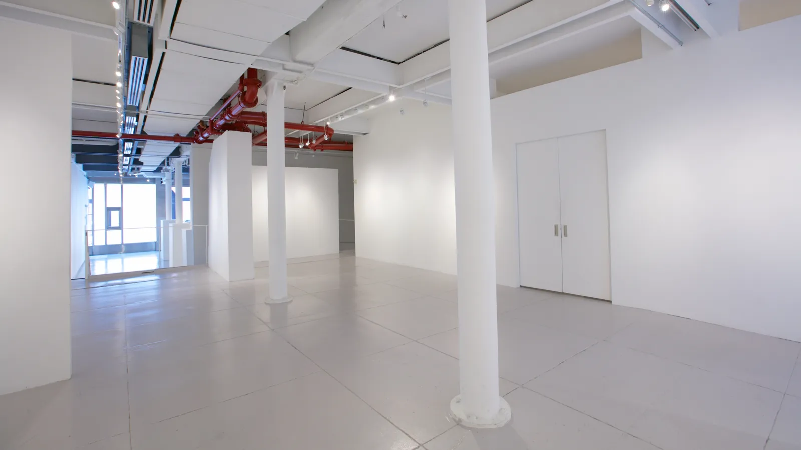 The upper level at 530 West 25th Street, looking back across the floor towards the daylight at the street frontage