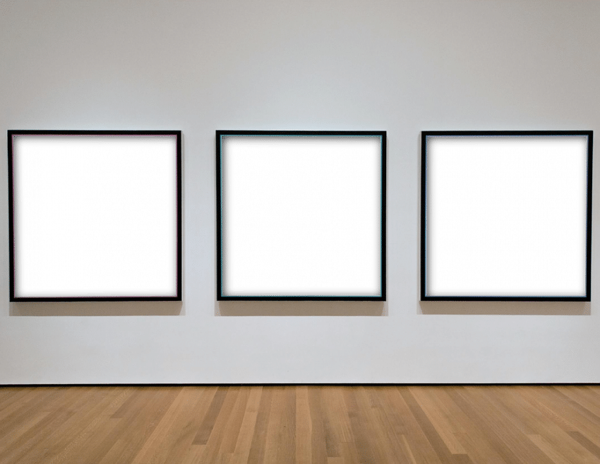 Blank picture frames mounted to a wall