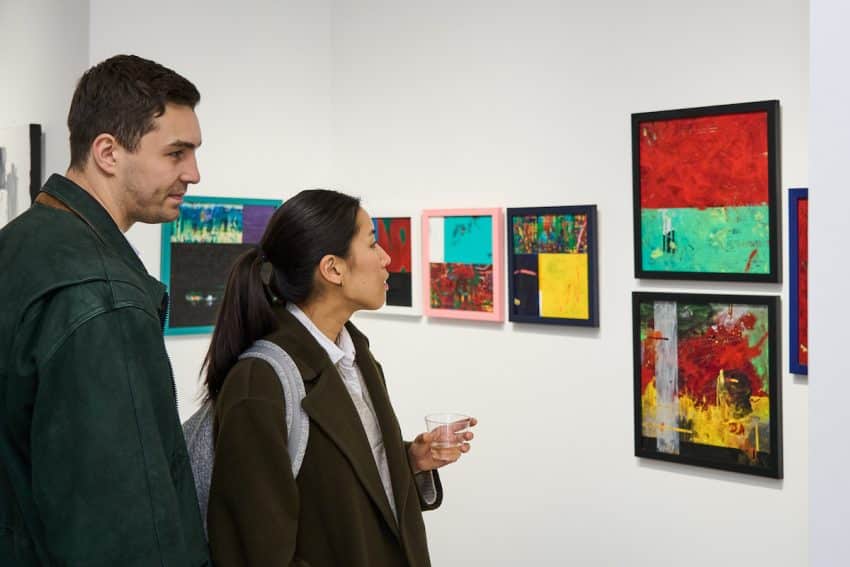 visitors checking an artwork