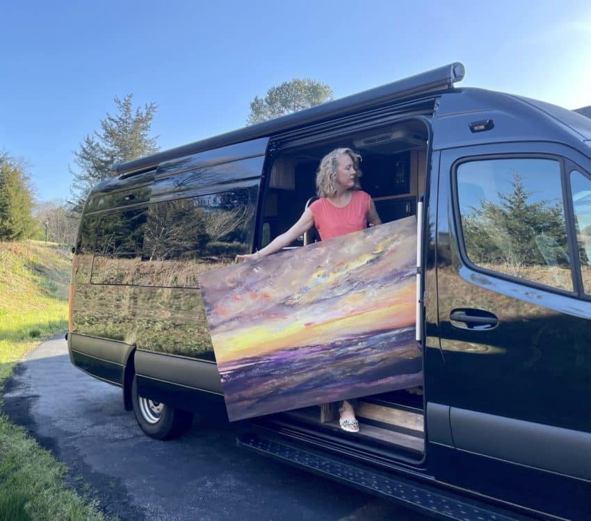 Christiane Palpant on the road with her paintings