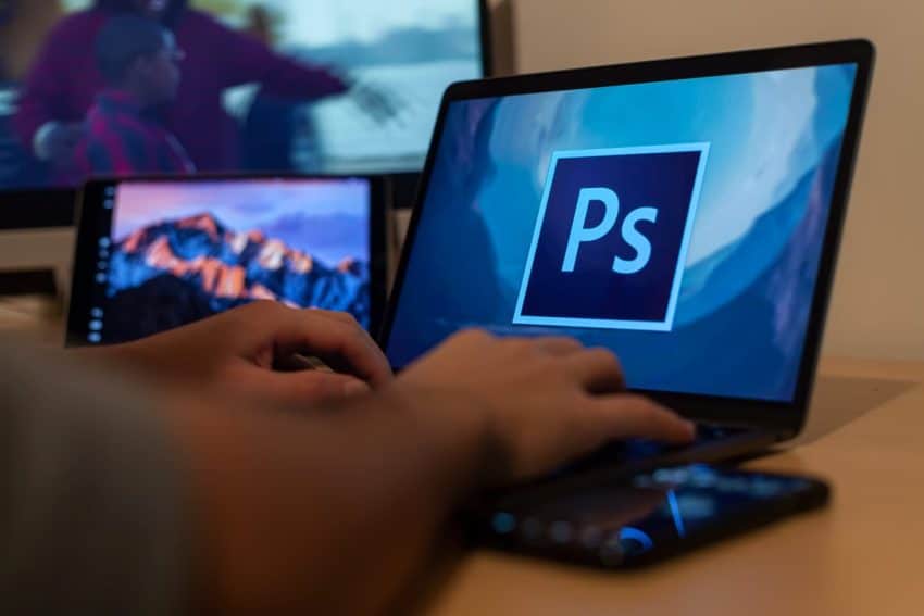 Adobe Photoshop on a laptop by Luca Sammarco