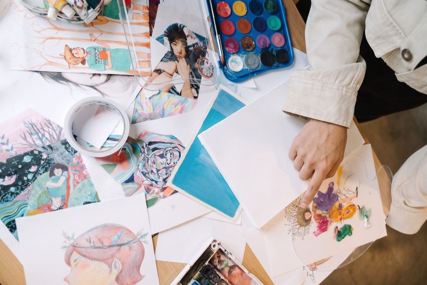 An artist curate and select specific illustrations from a scattered collection of finished works a portfolio submission.